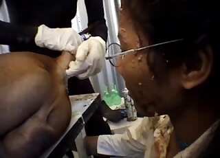 Nerdy babe gets covered in poo while licking dirty dog asshole