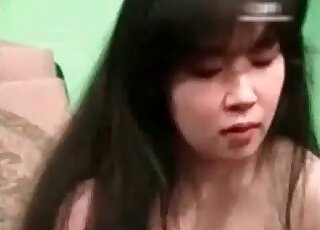 Asian brunette wants that husky to fuck her wet pussy right now