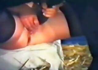 Wet twat of a kinky zoophile slut endures deep penetration in zoo porn