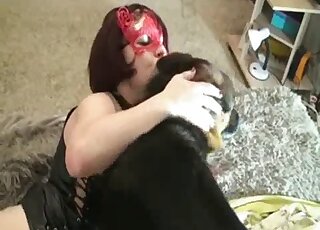 Housewife watches another housewife fuck a kinky animal on a bed