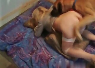 MILF stands in a doggystyle position to enjoy zoo sex with her dog