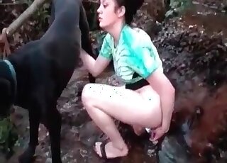 Cock craving mature wife stuffs filthy mouth with a canine’s dong