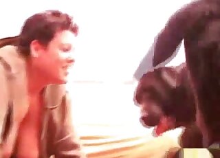 Inked momma with a huge ass fucks a black dog in a zoo sex tape