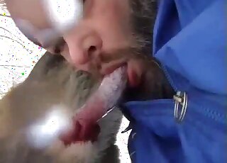 Naughty bestiality movie with a bearded dude that blows a dog in the woods